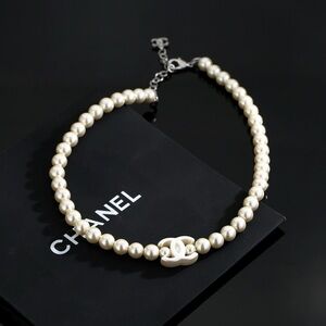 CHANEL Ivory Pearl Necklace with Logo